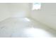Bedroom featuring natural light, neutral paint, and luxurious marble floors at 9200 Lunar Ln, Port Richey, FL 34668