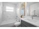 Bathroom featuring shower over the tub and single vanity at 9482 Noddy Tern Rd, Weeki Wachee, FL 34613