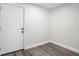 Empty Room featuring a light colored walls and ceiling with an exterior door at 9482 Noddy Tern Rd, Weeki Wachee, FL 34613