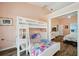 This room has wood floors and built-in bunk beds; it is connected to the main bedroom at 9757 Hermosillo Dr, New Port Richey, FL 34655