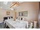 Dining room featuring stylish lighting, a decorative mirror, and seating for six at 9757 Hermosillo Dr, New Port Richey, FL 34655