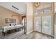 Grand foyer with high ceilings, a chandelier, and an adjacent dining area at 9757 Hermosillo Dr, New Port Richey, FL 34655