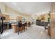 Open-concept kitchen featuring an island with bar seating and a view into the living area at 9757 Hermosillo Dr, New Port Richey, FL 34655