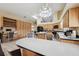 Large kitchen with ample storage, breakfast bar, and open layout at 9757 Hermosillo Dr, New Port Richey, FL 34655