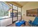 Relaxing enclosed lanai boasts views of pool, backyard, and the indoor kitchen at 9757 Hermosillo Dr, New Port Richey, FL 34655