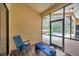 Enjoy a relaxed lanai seating area with pool and backyard views at 9757 Hermosillo Dr, New Port Richey, FL 34655