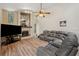 Comfortable living room with a fireplace and hardwood floors at 9757 Hermosillo Dr, New Port Richey, FL 34655