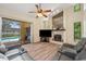 Living room showcasing a view of the pool through sliding glass doors at 9757 Hermosillo Dr, New Port Richey, FL 34655