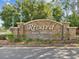 Elegant stone entrance sign for Rivard, a deed-restricted community, highlighting its established character at 2255 Long View Cir, Brooksville, FL 34604