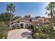 Beautiful home featuring a tile roof, well-manicured lawn, and a brick paver driveway at 10645 Garda Dr, Trinity, FL 34655