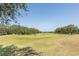Scenic view from the property, overlooking the lush green expanse of the golf course at 10645 Garda Dr, Trinity, FL 34655