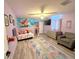 This bedroom features carpet and purple walls at 11080 Jackdaw Rd, Weeki Wachee, FL 34614