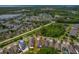The property and surrounding neighborhood's layout, with views of green spaces and community features at 11401 Quiet Forest Dr, Tampa, FL 33635
