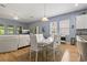 Open-concept dining area and living room, ideal for entertaining and Gathering gatherings at 11401 Quiet Forest Dr, Tampa, FL 33635