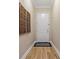 Neat entryway featuring hardwood floors and tasteful decor, setting a welcoming tone at 11401 Quiet Forest Dr, Tampa, FL 33635