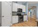 Well-equipped kitchen featuring modern appliances and a double oven for culinary enthusiasts at 11401 Quiet Forest Dr, Tampa, FL 33635