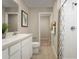 Functional bathroom with a shower-tub combo, white fixtures, and clean design providing a comfortable space at 11410 Spectacled Dr, New Port Richey, FL 34654