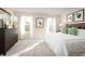 Well-lit bedroom with modern furnishings, stylish decor, and bright, airy atmosphere creating a welcoming retreat at 11410 Spectacled Dr, New Port Richey, FL 34654