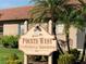 Sign for Pointe West Condominium Association at 11631 Bayonet Ln, New Port Richey, FL 34654
