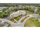 Aerial view of the community center with outdoor pool, parking, and community amenities at 11821 Boynton Ln, New Port Richey, FL 34654
