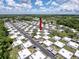 Expansive aerial of a residential community with mature trees and well-maintained landscaping at 11821 Boynton Ln, New Port Richey, FL 34654