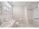 Bathroom featuring a white vanity with oval sink, toilet, and shower/tub with shower curtain at 12106 Bear Creek Ln, Hudson, FL 34667