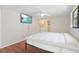 A comfortable main bedroom with an ensuite bathroom at 12106 Bear Creek Ln, Hudson, FL 34667