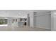 Open-concept living space showcasing tile floors, a kitchen island, and neutral paint, creating a seamless flow at 12192 Eskimo Curlew Rd, Weeki Wachee, FL 34614
