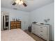 Inviting bedroom features a ceiling fan and ample natural light at 12250 Lacey Dr, New Port Richey, FL 34654