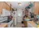 Functional kitchen with essential appliances, ample counter space, and classic cabinetry at 12250 Lacey Dr, New Port Richey, FL 34654