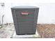 Close up of Airtemp brand A/C unit outside on concrete pad at 12411 Yorktown Ln, Hudson, FL 34667