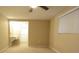Bedroom suite includes a large window, a sink vanity, and an ensuite bathroom at 12411 Yorktown Ln, Hudson, FL 34667