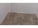 Close up shot of tile floor with white baseboards in room at 12411 Yorktown Ln, Hudson, FL 34667