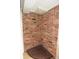 Red brick shower with drain at 12411 Yorktown Ln, Hudson, FL 34667