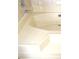 Close up of bathtub with tile surround at 13425 Bonita Ave, Spring Hill, FL 34609