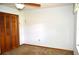 Bedroom with fan and closet, offering space for storage and relaxation at 13425 Bonita Ave, Spring Hill, FL 34609
