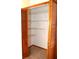 Walk-in closet with wire shelving at 13425 Bonita Ave, Spring Hill, FL 34609