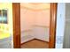 Walk-in closet with shelving at 13425 Bonita Ave, Spring Hill, FL 34609