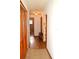 Hallway with closet space and tile flooring at 13425 Bonita Ave, Spring Hill, FL 34609