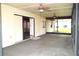 Enclosed screen porch with view of the back yard at 13425 Bonita Ave, Spring Hill, FL 34609
