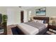 Comfortable bedroom with king bed, ensuite bathroom, and modern decor at 1402 Tallahassee Dr, Tarpon Springs, FL 34689