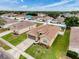 Lovely aerial view of a home with a spacious yard in a residential neighborhood at 15205 Durango Cir, Brooksville, FL 34604