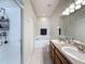 This bathroom features a double sink vanity, soaking tub, and walk-in shower at 15205 Durango Cir, Brooksville, FL 34604