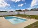 Enjoy this backyard pool, surrounded by a concrete patio, perfect for relaxing on a sunny day at 15205 Durango Cir, Brooksville, FL 34604