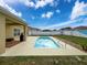 Backyard features a pool with a patio, perfect for outdoor lounging and entertainment with ample space at 15205 Durango Cir, Brooksville, FL 34604