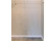 Walk-in closet with carpet flooring, neutral walls, white baseboards, and a wire shelf, offering ample storage at 15846 Stable Run Dr, Spring Hill, FL 34610