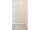Standard closet space that includes a wire shelf for added organization and storage at 15846 Stable Run Dr, Spring Hill, FL 34610