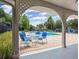 View of the community pool featuring ample seating and a relaxing atmosphere at 15846 Stable Run Dr, Spring Hill, FL 34610