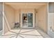 Screened lanai with view into home's kitchen at 15846 Stable Run Dr, Spring Hill, FL 34610
