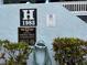 A smoke-free community building featuring neighborhood watch and emergency contact information at 1983 Abrico Dr # H-9, Lutz, FL 33558
